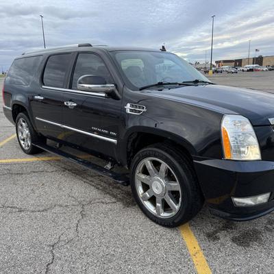 Sale Photo Thumbnail #52: 2011 Cadillac Escalade ESV AWD Premium Package with 270k miles will be sold to the highest bidder. Credit Cards/Venmo will not be accepted for this sale. Only cash or bank certified check. 12% buyers premium will apply to final sale of this vehicle. 
Feat