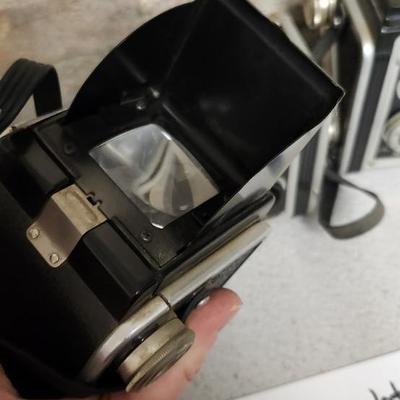 Sale Photo Thumbnail #422: A pair of Duaflex II and a Duaflex. Fits a medium flat rate box