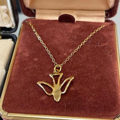 2 gold tone bird necklaces
