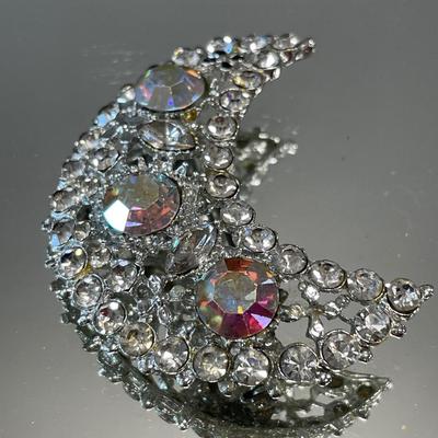 Sparkling star and moon brooches