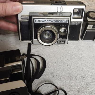 Sale Photo Thumbnail #468: Mixed lot of Instamatic type cameras. 8 total. Fits a medium flat rate box