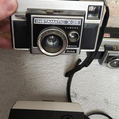 Sale Photo Thumbnail #467: Mixed lot of Instamatic type cameras. 8 total. Fits a medium flat rate box