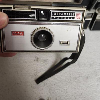 Sale Photo Thumbnail #465: Mixed lot of Instamatic type cameras. 8 total. Fits a medium flat rate box