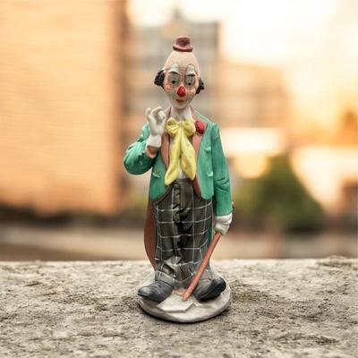 Sale Photo Thumbnail #122: Vintage Porcelain Clown Figurine 9.5" tall