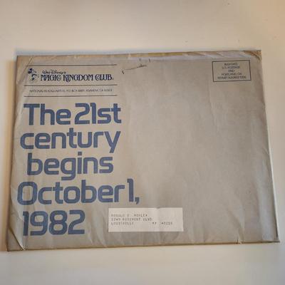 Sale Photo Thumbnail #455: This auction lot is for a Disney Epcot Center Introduction Brochure - 1982.  This brochure/booklet comes in original mailing envelope with letter from Disney's Magic Kingdom Club.  This brochure/booklet is full of color photos and drawings showing the the