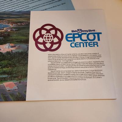 Sale Photo Thumbnail #461: This auction lot is for a Disney Epcot Center Introduction Brochure - 1982.  This brochure/booklet comes in original mailing envelope with letter from Disney's Magic Kingdom Club.  This brochure/booklet is full of color photos and drawings showing the the