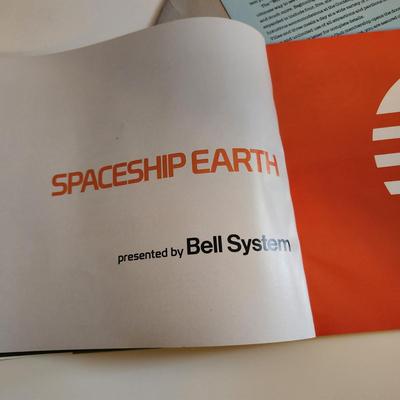 Sale Photo Thumbnail #462: This auction lot is for a Disney Epcot Center Introduction Brochure - 1982.  This brochure/booklet comes in original mailing envelope with letter from Disney's Magic Kingdom Club.  This brochure/booklet is full of color photos and drawings showing the the