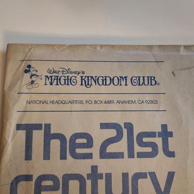 Sale Photo Thumbnail #456: This auction lot is for a Disney Epcot Center Introduction Brochure - 1982.  This brochure/booklet comes in original mailing envelope with letter from Disney's Magic Kingdom Club.  This brochure/booklet is full of color photos and drawings showing the the