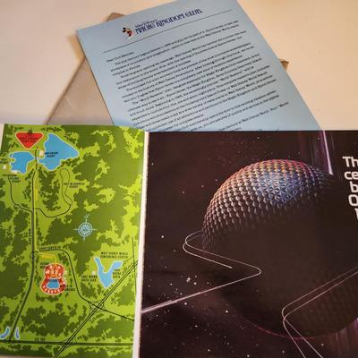 Sale Photo Thumbnail #459: This auction lot is for a Disney Epcot Center Introduction Brochure - 1982.  This brochure/booklet comes in original mailing envelope with letter from Disney's Magic Kingdom Club.  This brochure/booklet is full of color photos and drawings showing the the
