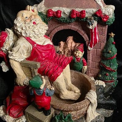 Santa Relaxing by the Fireplace Figurine – 8" Holiday Scene with Elves & Christmas Hearth