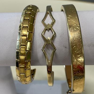 Amber bead necklace and gold tone bracelets