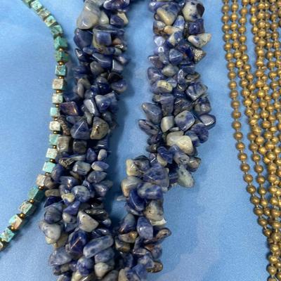 Sale Photo Thumbnail #4: 4 Great necklaces.  The Late-Victorian gold beaded necklace is cool.  The Lapis chunk necklace is nice too.  The Coral (red) looks to be glass.