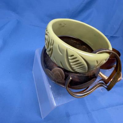 Sale Photo Thumbnail #53: 5 bracelets, very clean.  The top left one is Lucite, not Bakelte