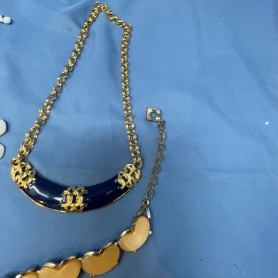Sale Photo Thumbnail #60: The white set is glass!  The rhinestone necklace has some discoloration.