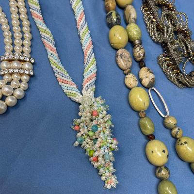 Sale Photo Thumbnail #71: The pearls has one strand end needs attached.  The two mini bead necklaces look to be 1920s.