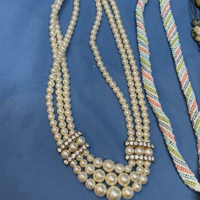 Sale Photo Thumbnail #70: The pearls has one strand end needs attached.  The two mini bead necklaces look to be 1920s.