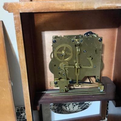 Sale Photo Thumbnail #193: Herschede Westminster chime wall clock.  Back is off and one foot is off.  No key but it works.