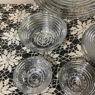 Sale Photo Thumbnail #289: Your Get Heiser clear glass serving plate, three salad plates, bowl, and three sherbets.