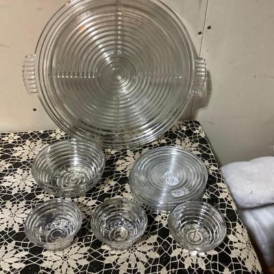 Sale Photo Thumbnail #287: Your Get Heiser clear glass serving plate, three salad plates, bowl, and three sherbets.
