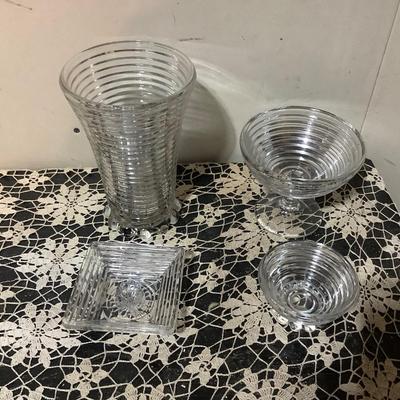 Sale Photo Thumbnail #291: You get Heiser clear glass tall vase, footed bowl, sherbet, square dish.