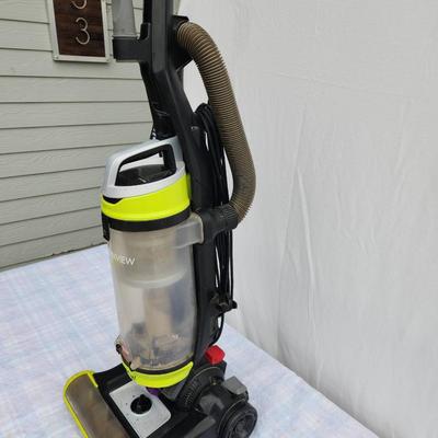 Sale Photo Thumbnail #107: Bissell CleanView Swivel Pet Upright Vacuum Cleaner designed for pet owners. Features a swivel steering mechanism for easy maneuverability, a large dirt cup, a multi-cyclonic suction system, and a specialized pet hair tool. Includes a washable filter and 