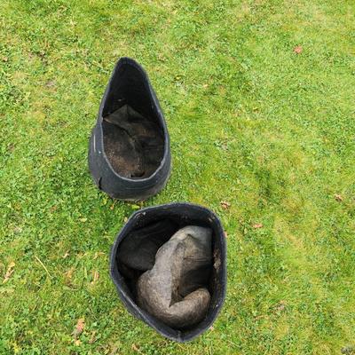 Sale Photo Thumbnail #135: Black fabric garden planter pots designed for growing plants. Each pot has reinforced handles for portability and a breathable material for soil aeration. The approximate height of each pot is visible next to a measuring tape, suggesting they are about 15