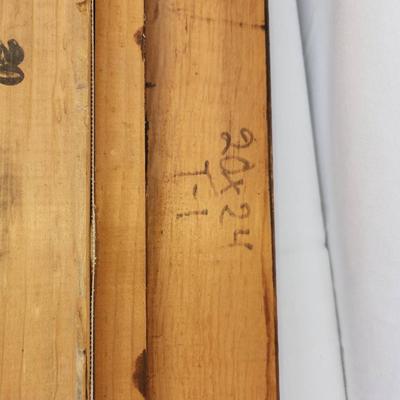 Sale Photo Thumbnail #149: Wicker fishing creel with leather trim and straps, featuring a lid with a slot for fish entry and a buckle closure mechanism for securing the contents. The creel is designed for outdoor fishing use, with carrying straps for convenience. In used condition,