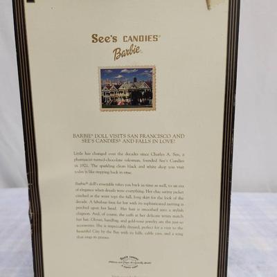 Sale Photo Thumbnail #24: Special Edition Barbie doll titled 'I Left My Heart in San Francisco,' produced in collaboration with See's Candies. The doll is presented in a themed packaging featuring classic San Francisco elements and a See's Candies storefront. Includes elegant atti