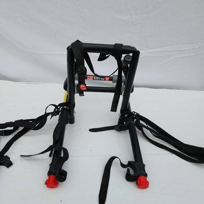 Sale Photo Thumbnail #181: Allen Sports Model 102DN 2-Bike Trunk Mount Rack constructed with a durable steel frame. Features a compact and foldable design for convenient storage, along with adjustable tie-down straps for securely holding up to two bicycles. Includes foam padding to