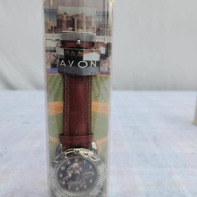 Sale Photo Thumbnail #230: Cal Ripken themed Sports Superstars watch, featuring a leather strap and a unique dial design. Comes in its original packaging, which showcases related artwork and details. The item appears to be labeled FSC: 24946-7, and it highlights the baseball supers