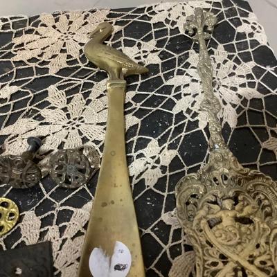 Sale Photo Thumbnail #254: You get metal serving piece, metal shoe horn, two metal door handle plates, cookie cutter, mics metal items and blue glass canning jar.