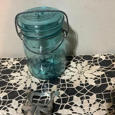 Sale Photo Thumbnail #260: You get metal serving piece, metal shoe horn, two metal door handle plates, cookie cutter, mics metal items and blue glass canning jar.