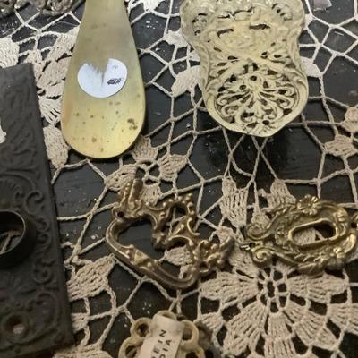 Sale Photo Thumbnail #255: You get metal serving piece, metal shoe horn, two metal door handle plates, cookie cutter, mics metal items and blue glass canning jar.