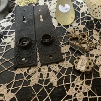 Sale Photo Thumbnail #256: You get metal serving piece, metal shoe horn, two metal door handle plates, cookie cutter, mics metal items and blue glass canning jar.