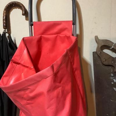 Sale Photo Thumbnail #463: You get this nice cart, a black and wood umbrella, and a vintage hand saw.