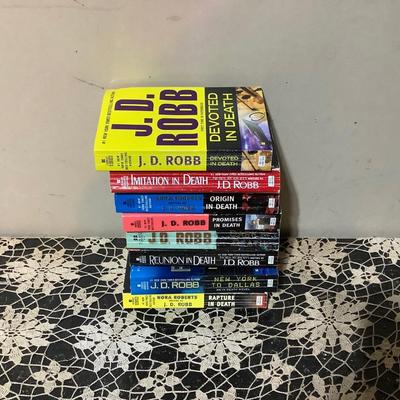 Sale Photo Thumbnail #467: JD Robb book lot 8 books.