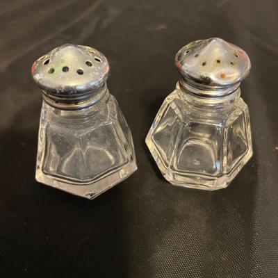 A COLLECTION OF SALT AND PEPPER SHAKERS