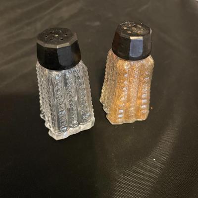 A COLLECTION OF SALT AND PEPPER SHAKERS