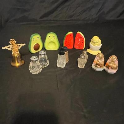 A COLLECTION OF SALT AND PEPPER SHAKERS