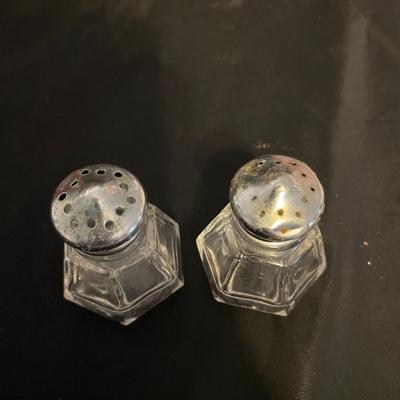 A COLLECTION OF SALT AND PEPPER SHAKERS