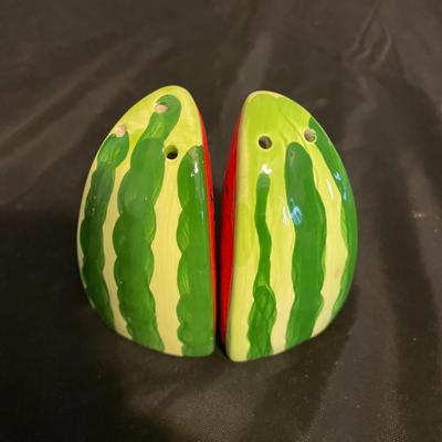 A COLLECTION OF SALT AND PEPPER SHAKERS