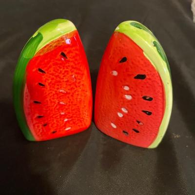 A COLLECTION OF SALT AND PEPPER SHAKERS