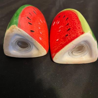 A COLLECTION OF SALT AND PEPPER SHAKERS