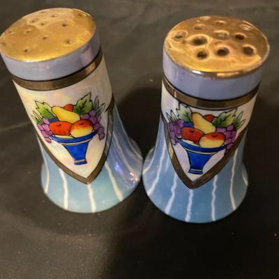 A COLLECTION OF SALT AND PEPPER SHAKERS