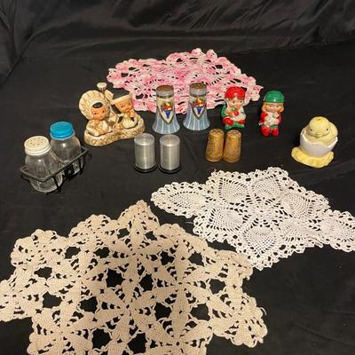 A COLLECTION OF SALT AND PEPPER SHAKERS