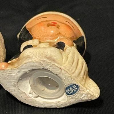 A COLLECTION OF SALT AND PEPPER SHAKERS