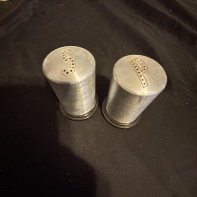 A COLLECTION OF SALT AND PEPPER SHAKERS