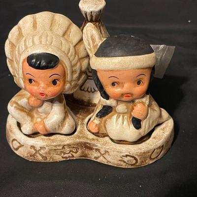 A COLLECTION OF SALT AND PEPPER SHAKERS