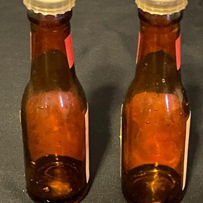 A COLLECTION OF SALT AND PEPPER SHAKERS