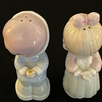 A COLLECTION OF SALT AND PEPPER SHAKERS